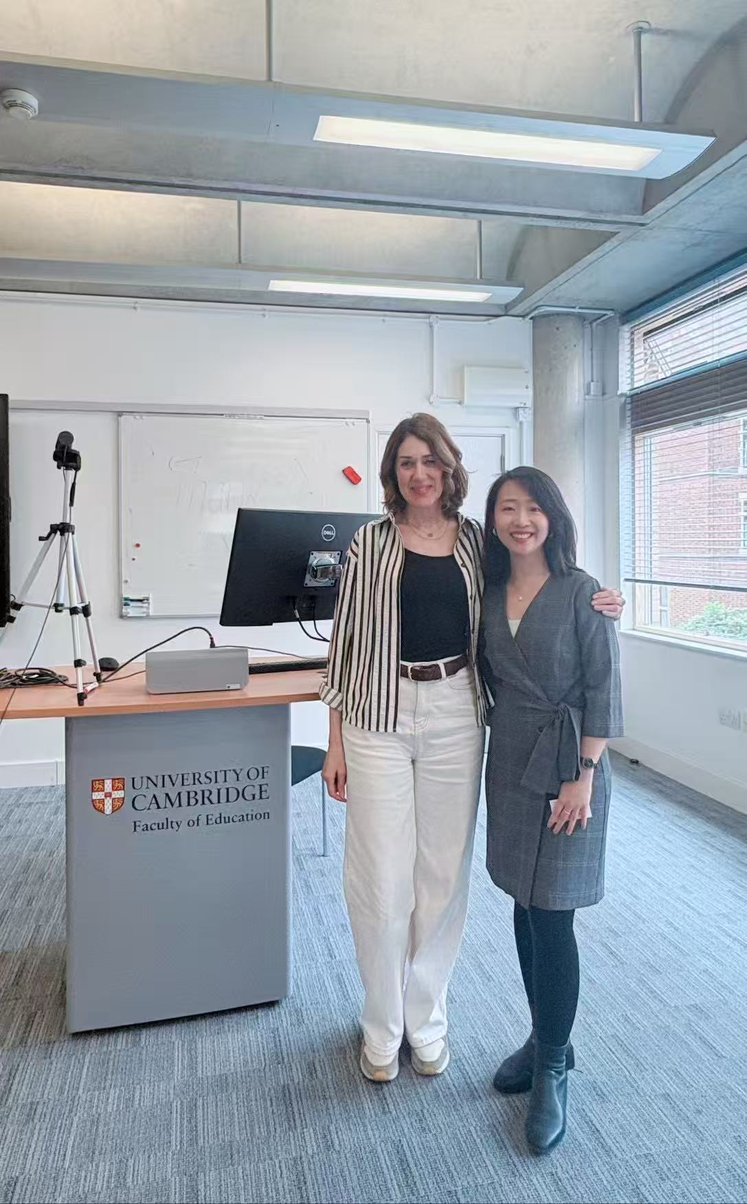Sihan Zhou giving a talk at the University of Cambridge
